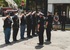officers saluting each other