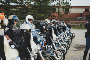 line of police on motorcycles