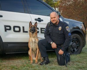 Police officer with his canine unit partner